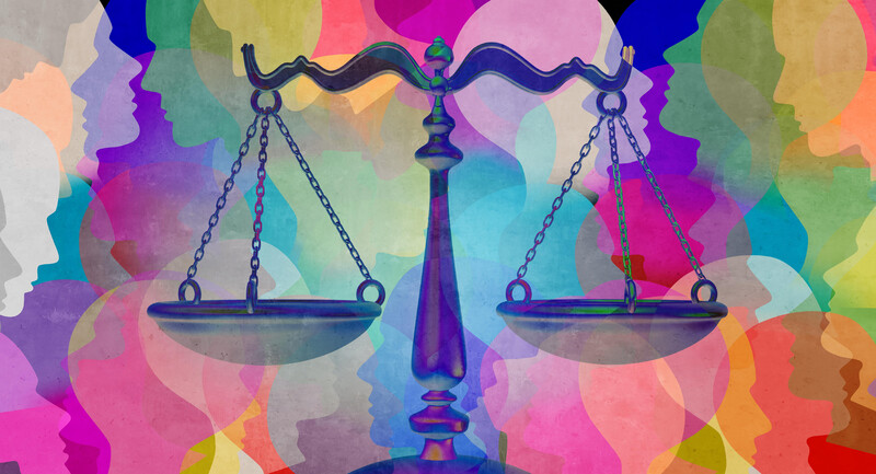 Colorful background made of people's overlapping silhouettes with a scale of justice in the foreground symbolizing equity and social justice.